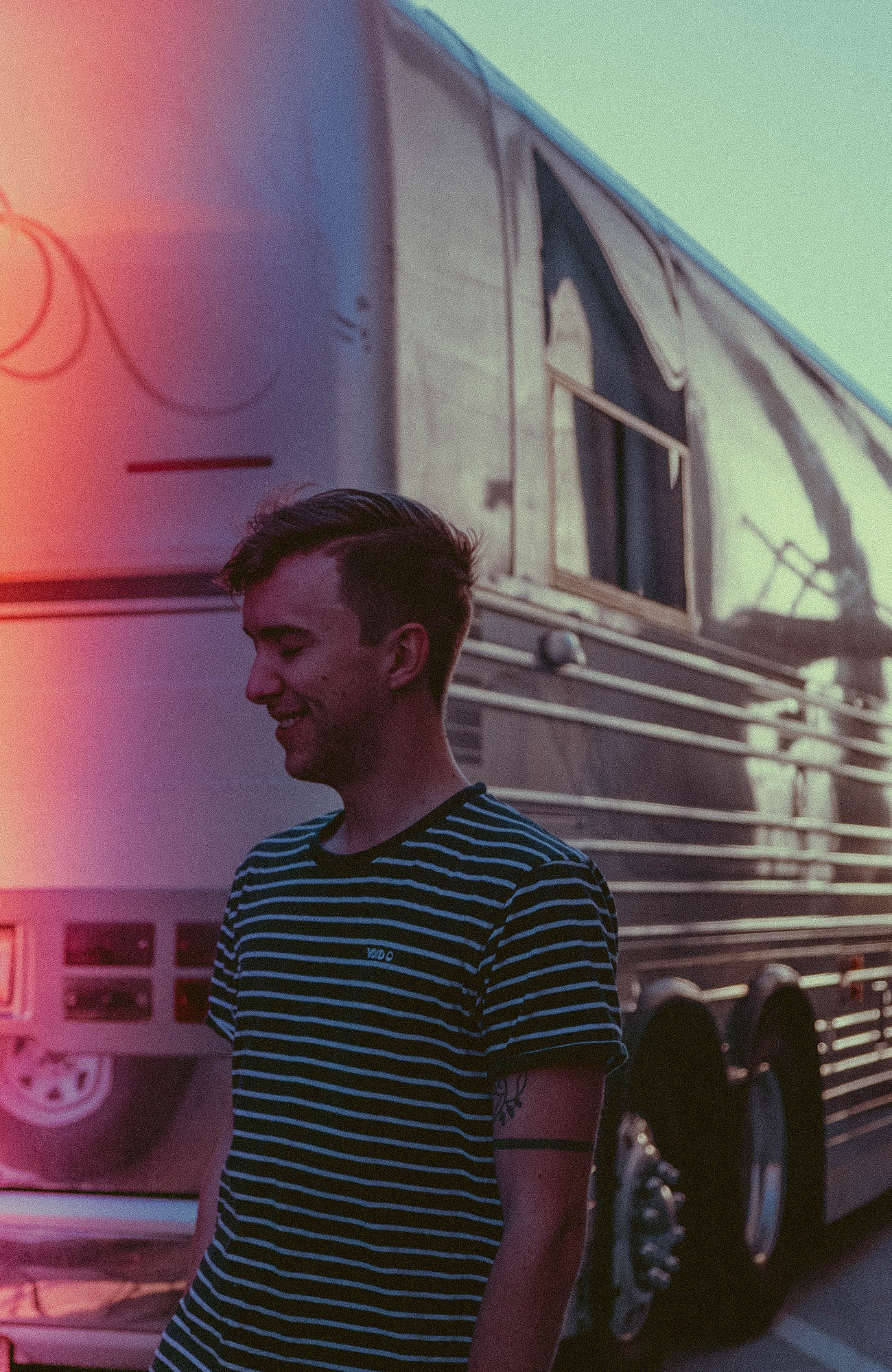 bus-male-traveller-next-to-bus-sidebar