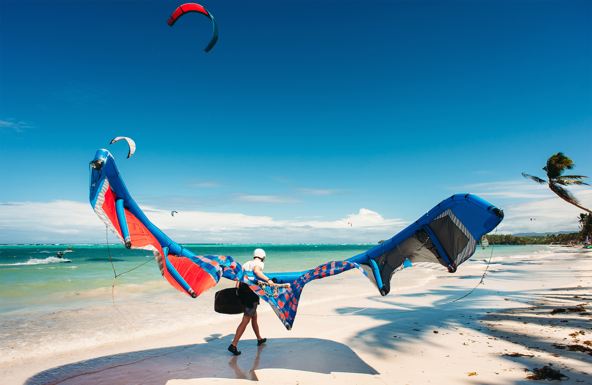Kitesurfer with his gear on a beach on Boracay in the Philippines
