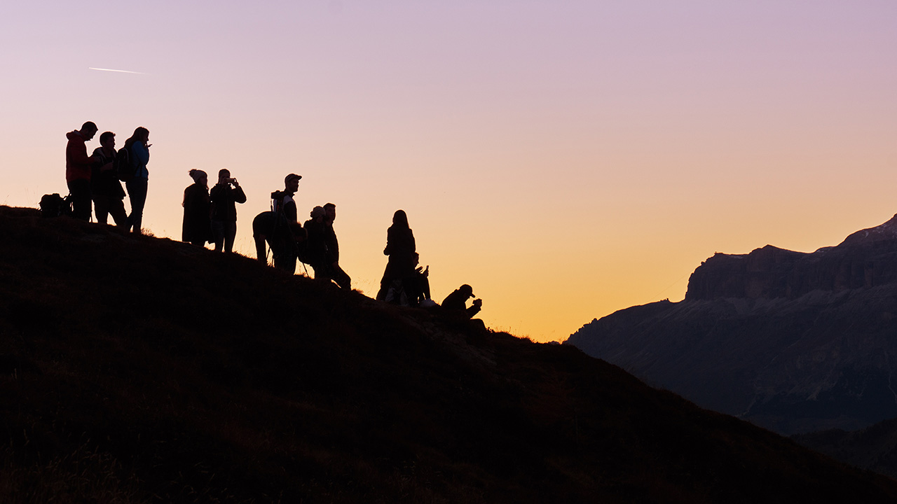 group-travel-sunset