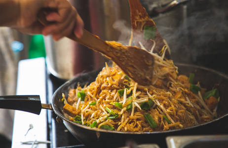 Person Cooking Phad Thai Cover