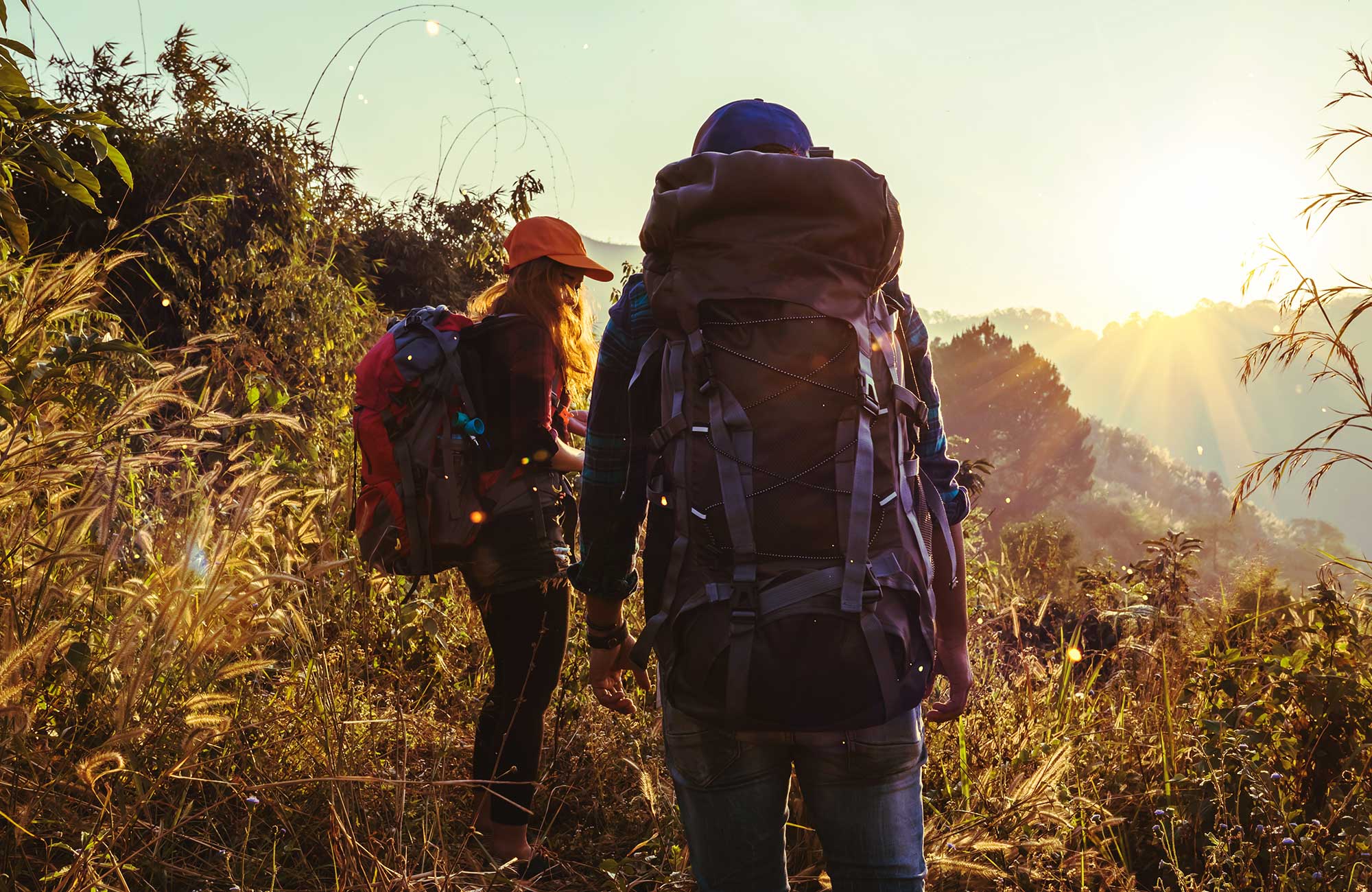 Backåackers On Field