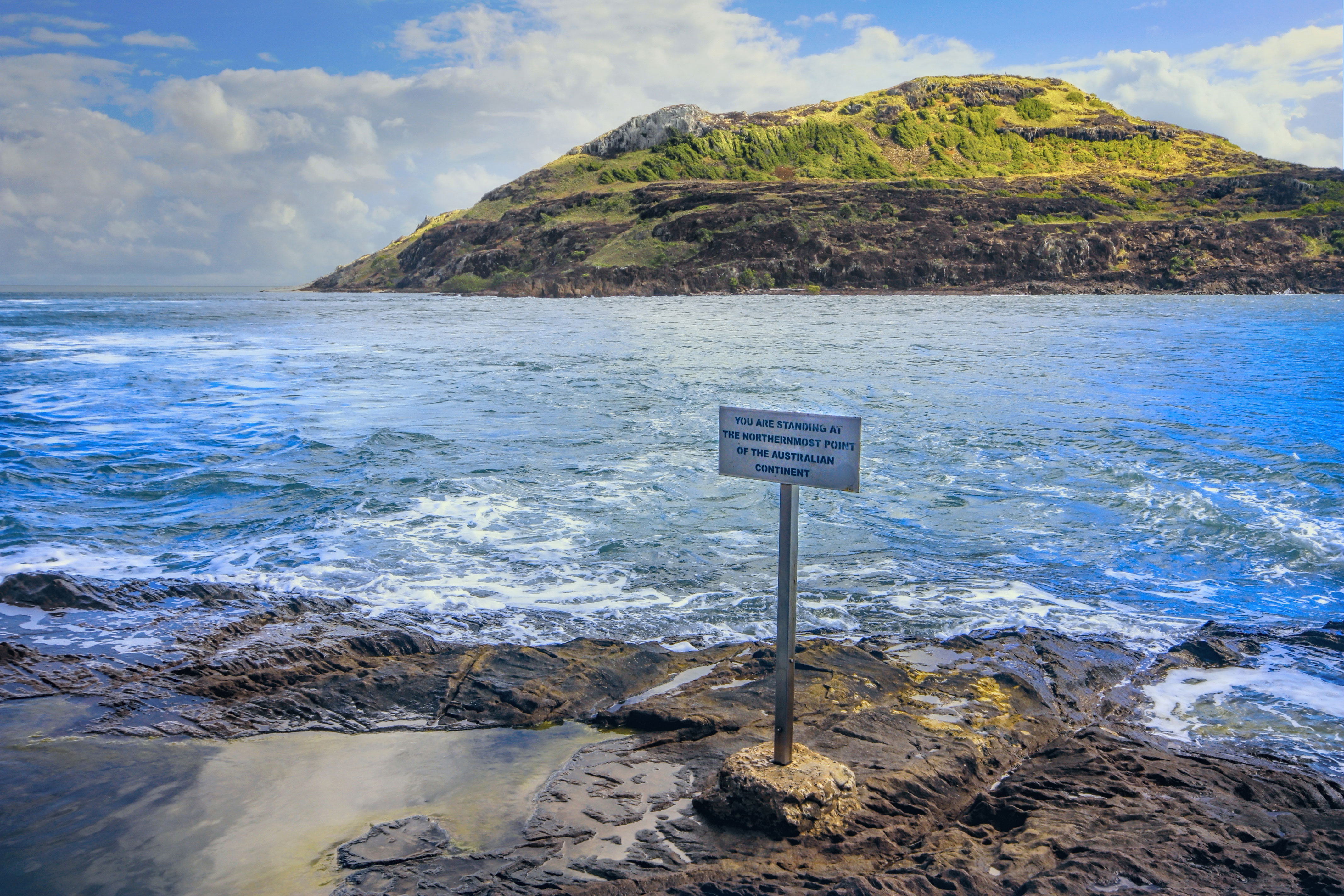 Sign on the beach of Cape York, the northernmost point of Australia
